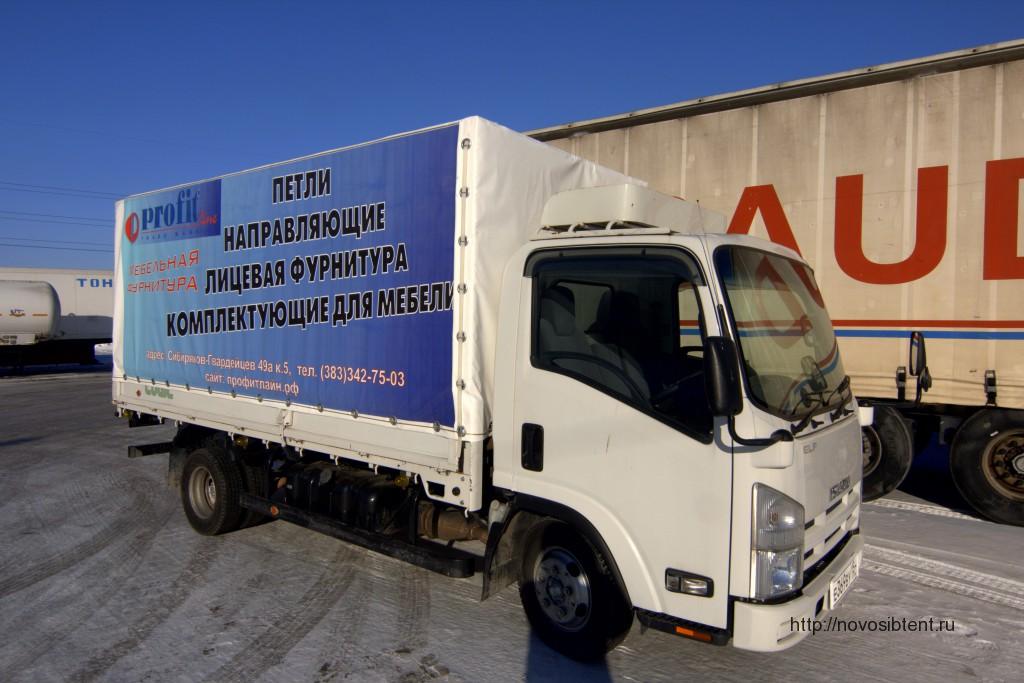 Реклама на тенте грузовика Isuzu Elf в Новосибирске